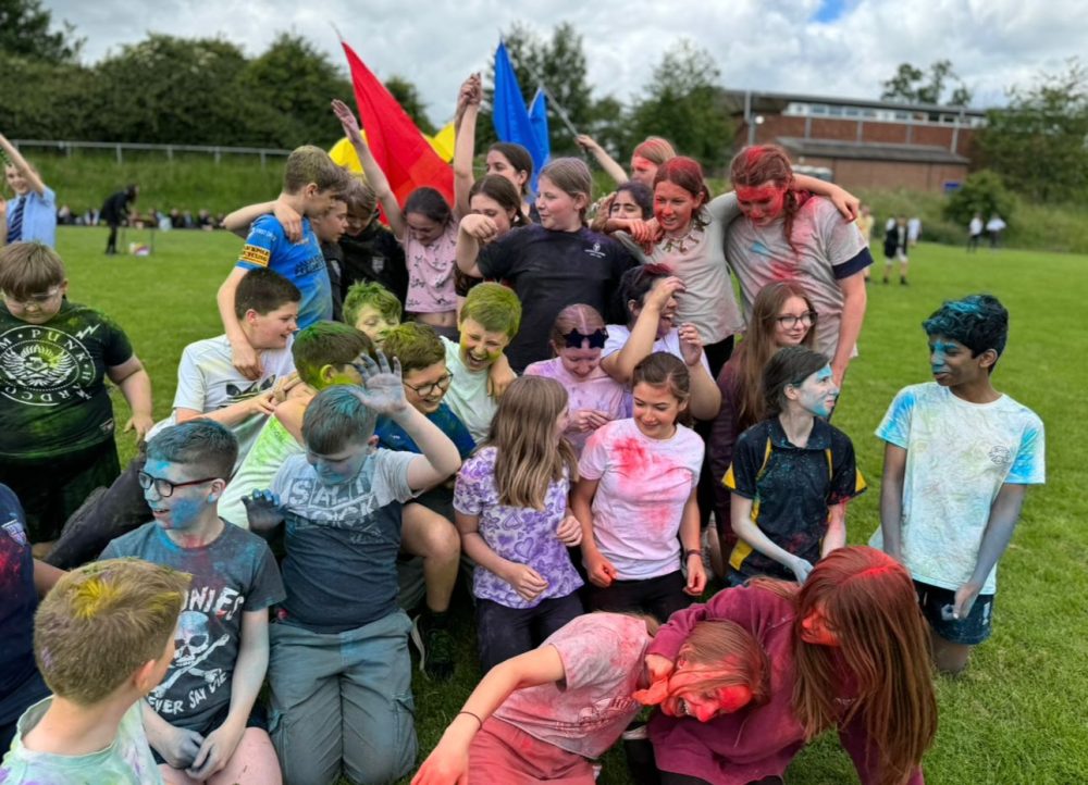 A big group of Bishop Perowne students celebrating the colour run